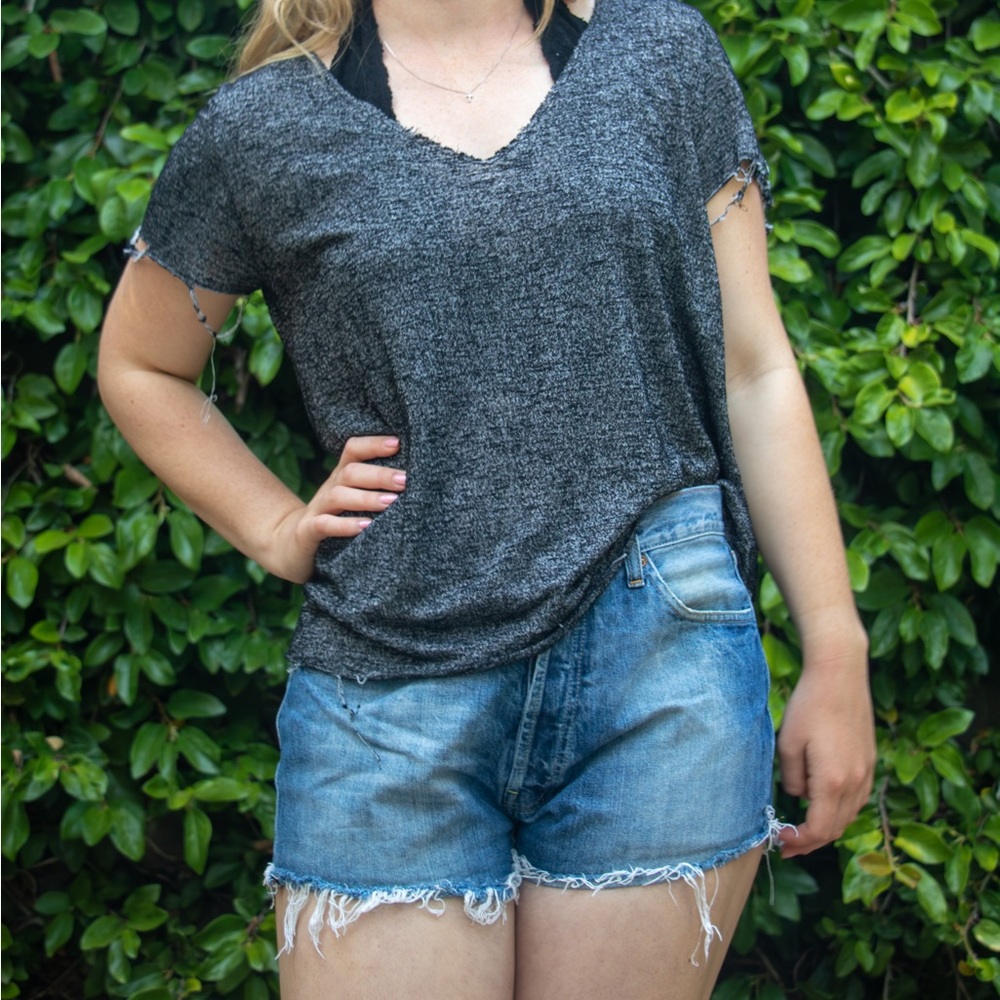 Urban Outfitters-  loose fitting t-shirt with distressed/ frayed edges